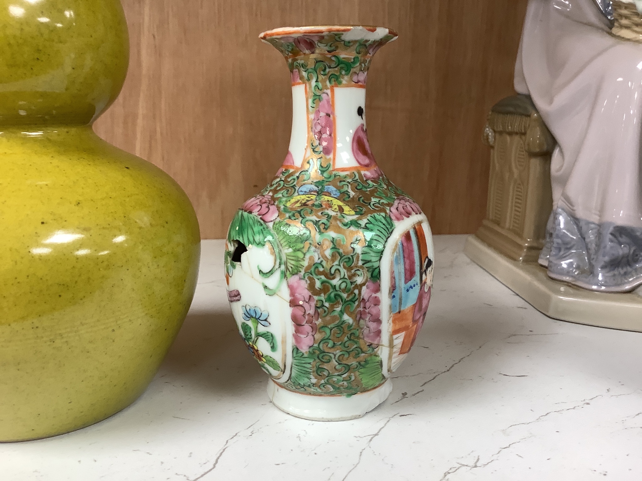 A Chinese yellow ground double gourd vase and a similar famille rose baluster vase, tallest 18cm